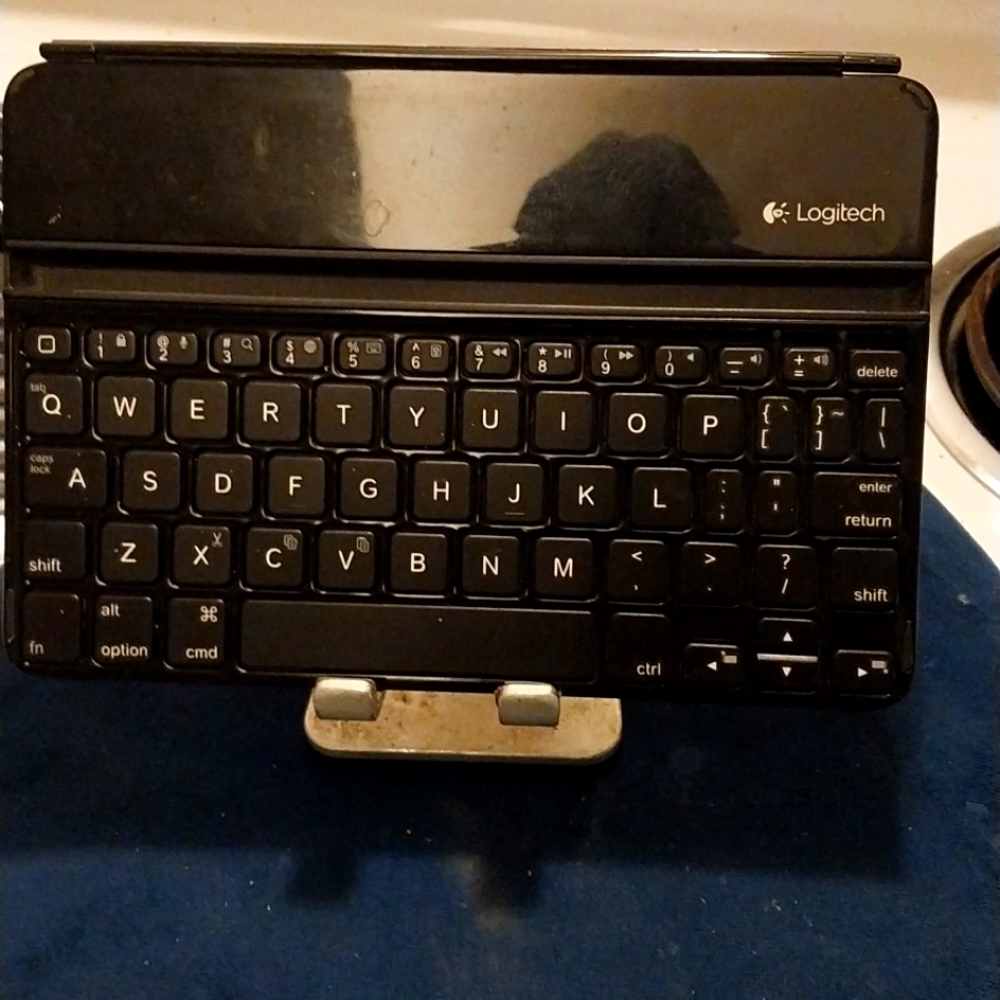 Logitech Ultra Thin Blue tooth Tablet /IPad keyboard.
